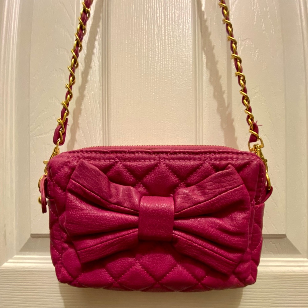 Pink quilted bow purse with chain strap